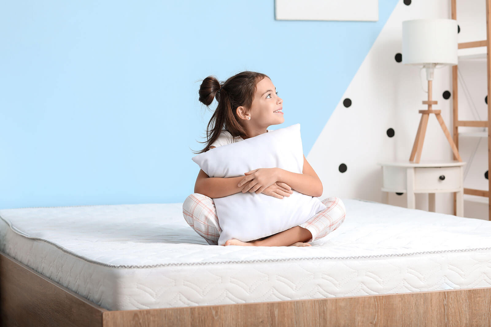 kid on mattress